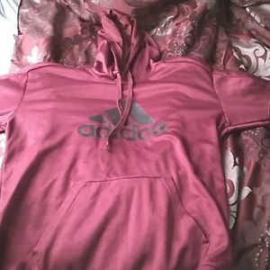 A maroon Adidas Hoodie